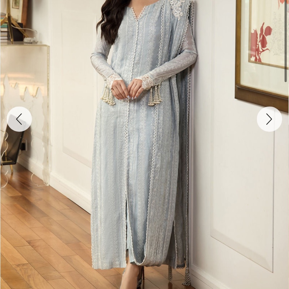 Serish rehan brand new.  Medium size salwar kameez pakistani